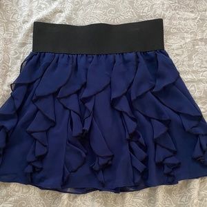 Blue express mini skirt with ruffles.